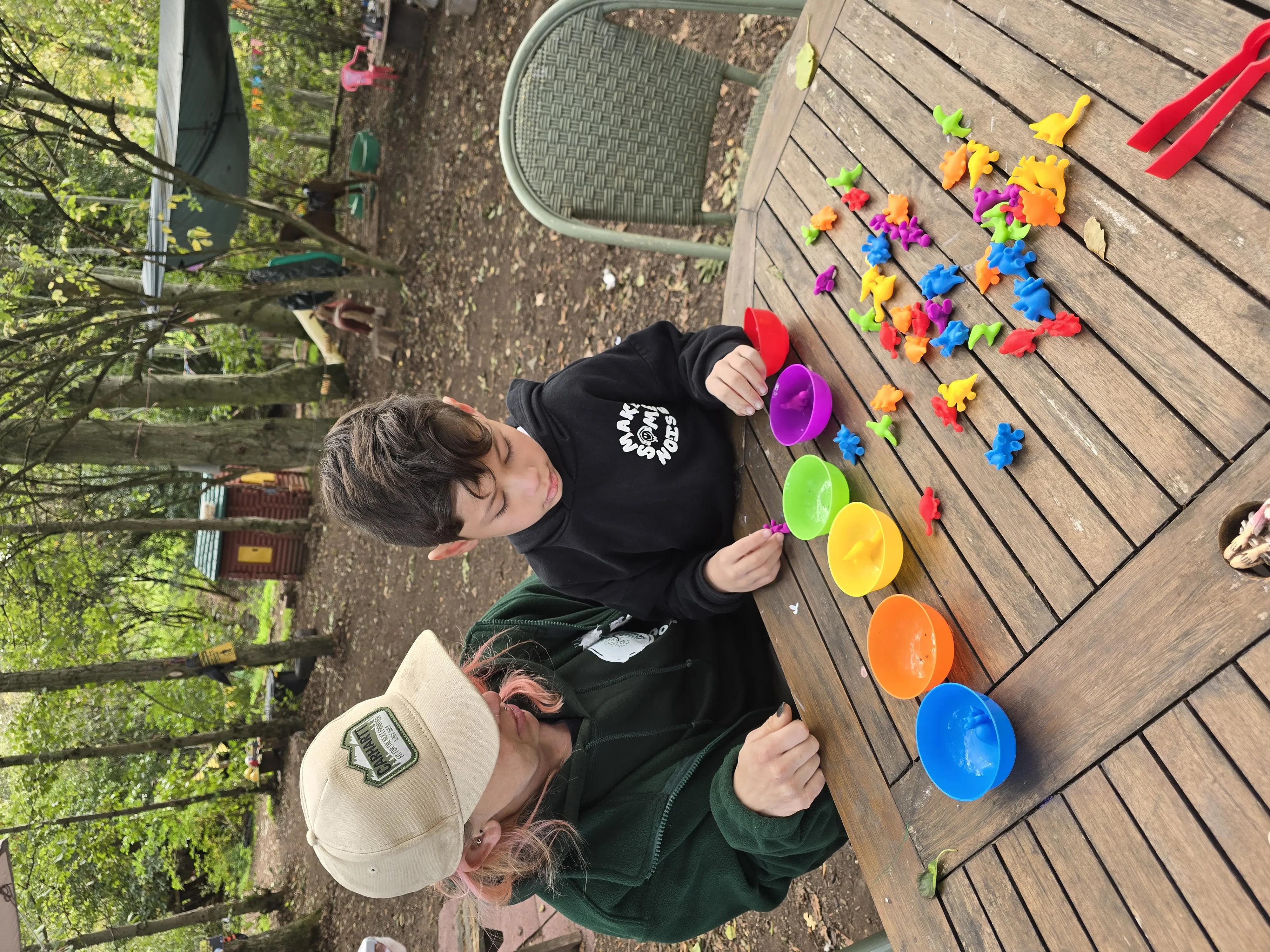 Children learning outdoors at Forest Families